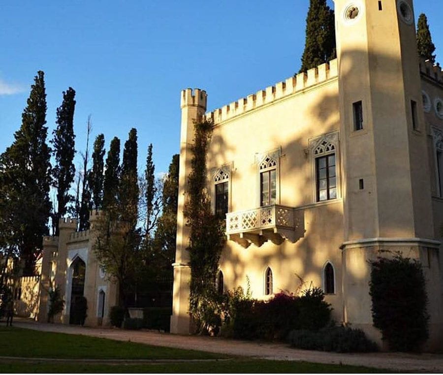one side of the tall towers part of Pyrgos Vasilissis winery
